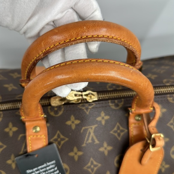 Authenticated Louis Vuitton Monogram Keepall 55 - Picture 12 of 16